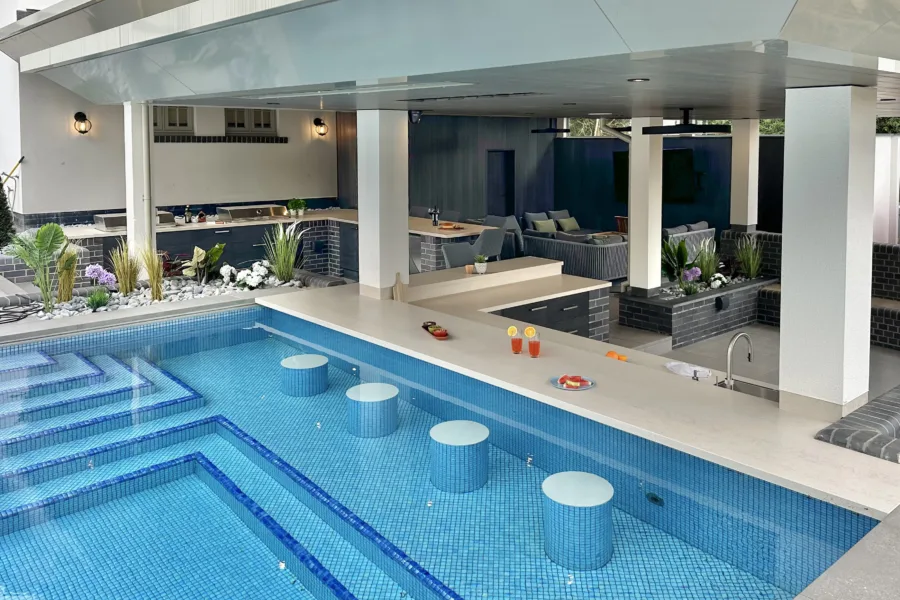 Outdoor kitchen with swim up bar